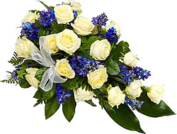 Fascio funebre di rose bianche e fiori misti